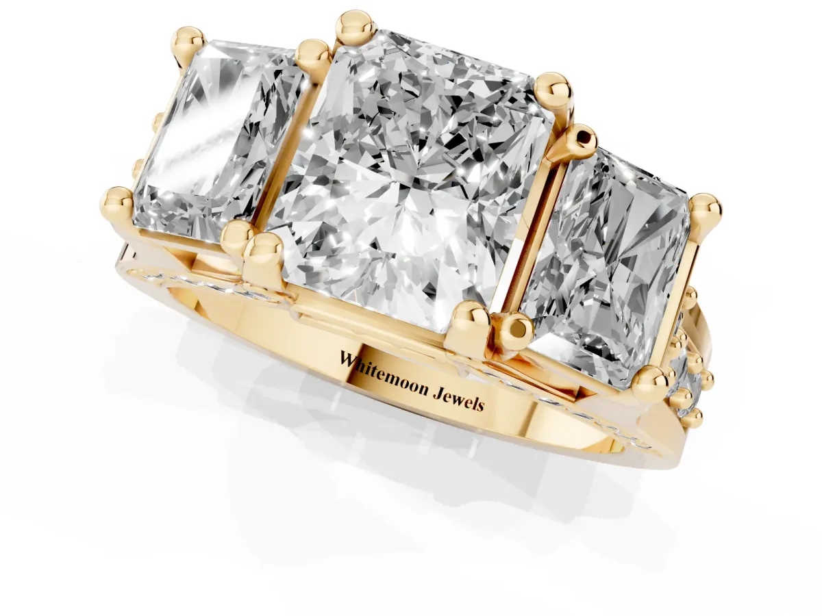Radiant Cut Diamond Three-Stone Ring with Channel Set Band and Four-Prong Setting Yellow gold