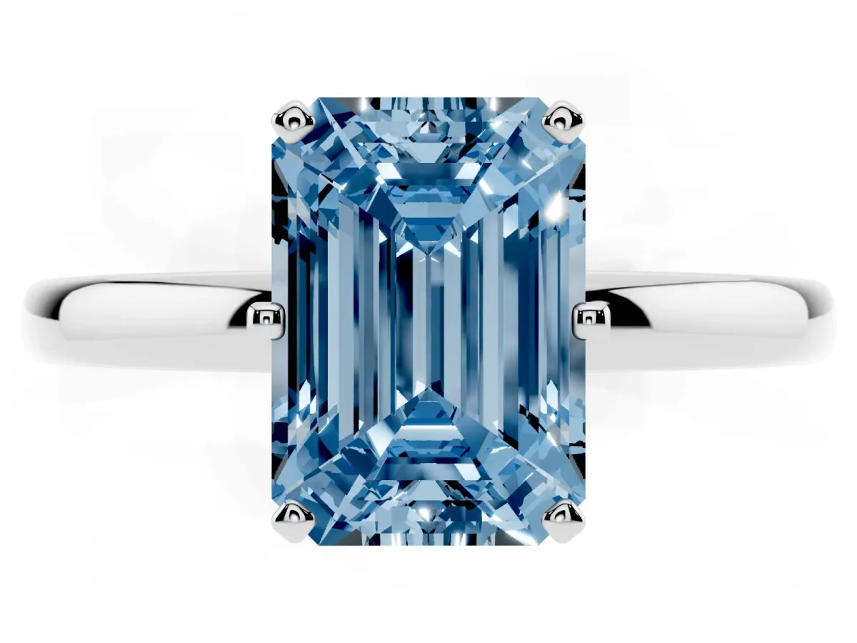 Fancy Blue Emerald Cut Solitaire Diamond Ring with Six-Prong Setting on a Classic Band Platinum