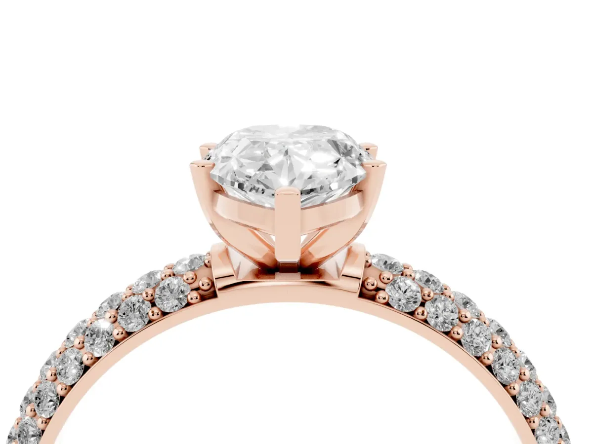 Pear Cut Diamond Solitaire Ring with Prong Setting and Pavé Band Rose gold