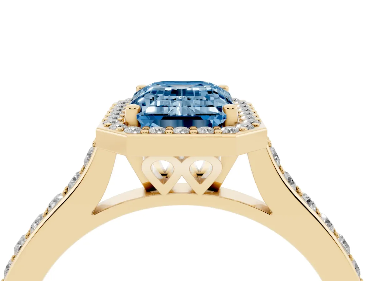 Fancy Blue Emerald Cut Diamond Halo Engagement Ring with Round Pavé Shoulders and Prong Setting Yellow gold
