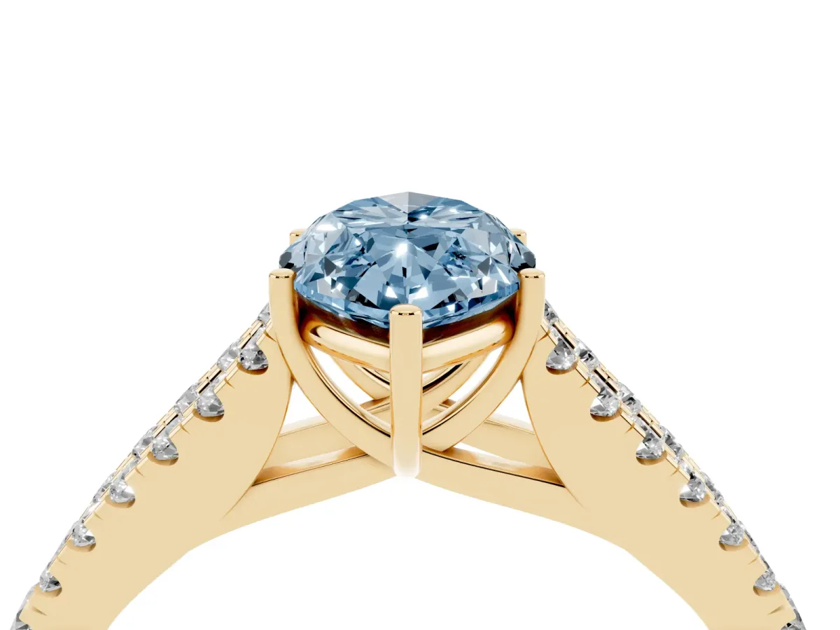 Fancy Blue Marquise Cut Diamond Split Shank Engagement Ring with Round Pavé and Prong Setting Yellow gold