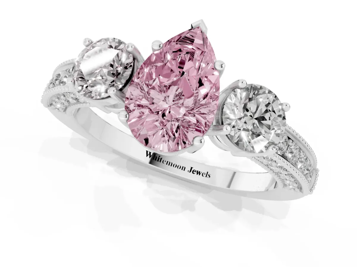 Fancy Pink Pear Cut Three-Stone Diamond Ring with Pavé Band and Four-Prong Setting Silver