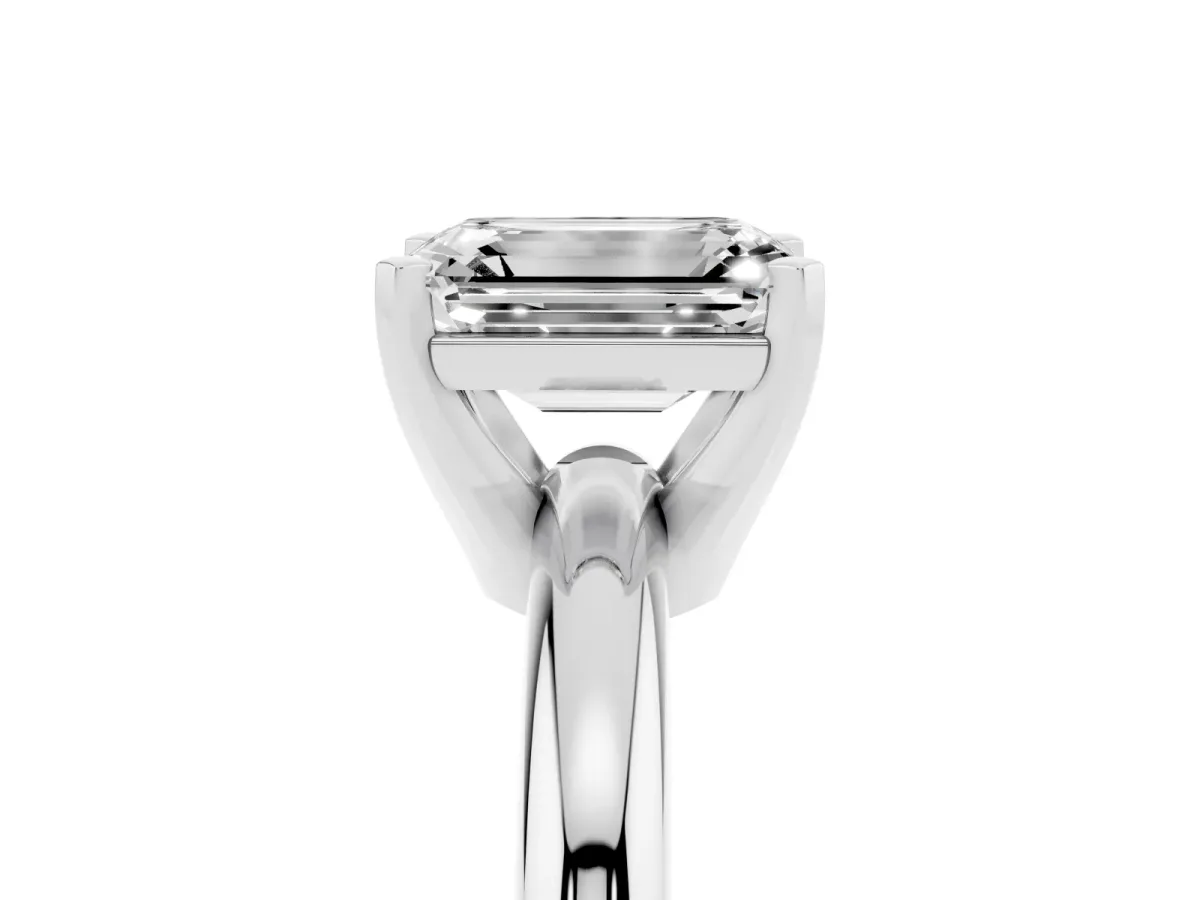 Emerald Cut Diamond Solitaire Engagement Ring with Round Band and Four-Prong Setting Silver