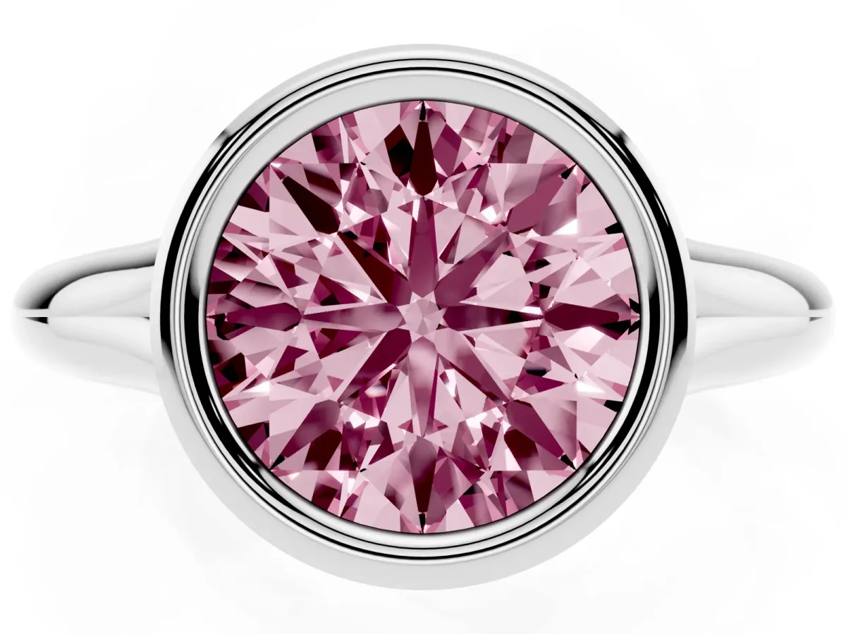 Fancy Pink Bezel Set Round Cut Solitaire Diamond Ring with Smooth Band Silver