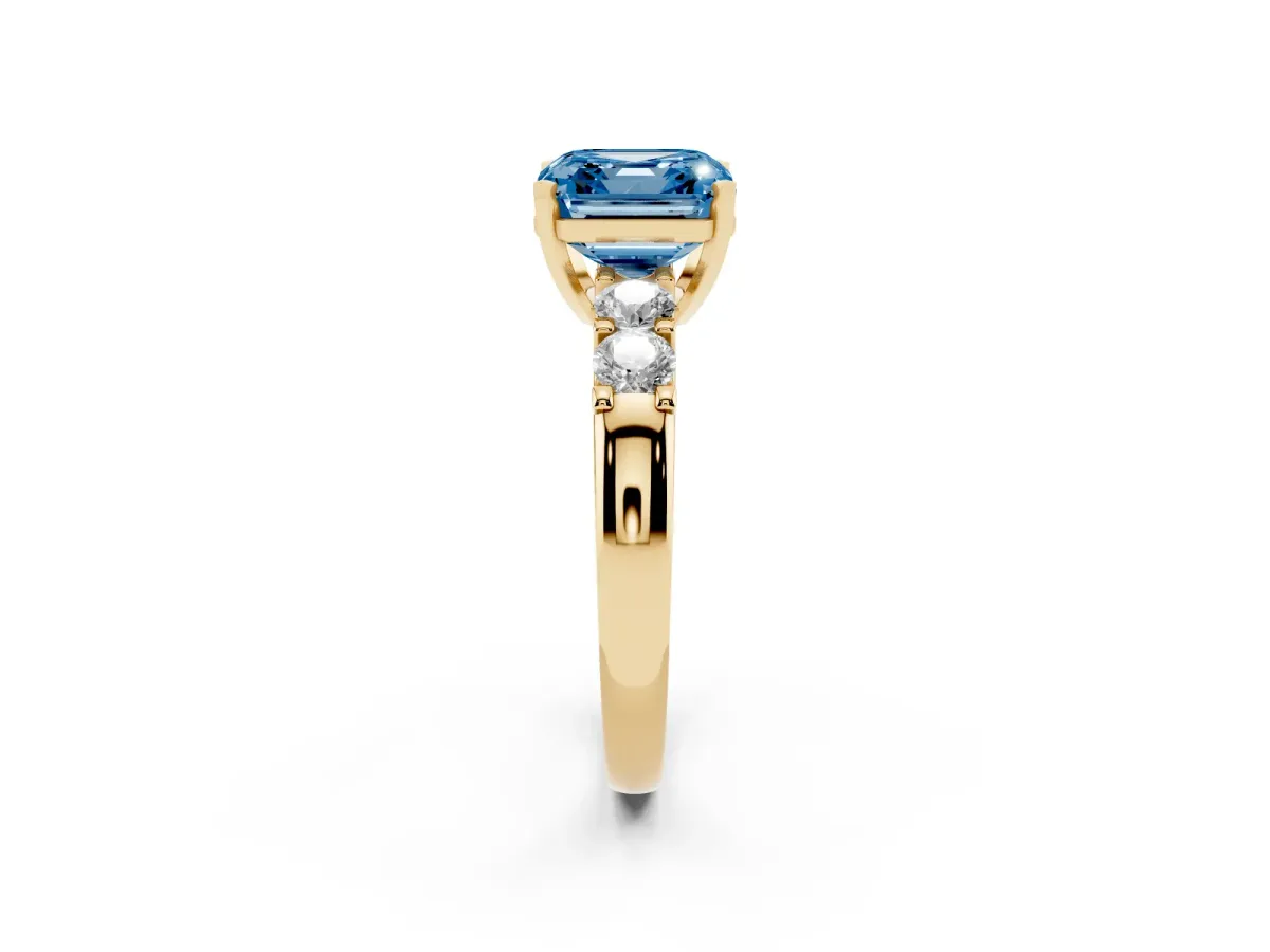 Fancy Blue Asscher Cut Brilliant Cut Diamond Five-Stone Prong Set Engagement Ring with Channel Band Yellow gold