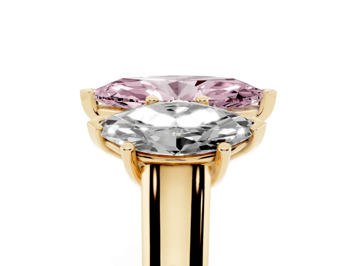 Fancy Pink Marquise Cut Three-Stone Diamond Ring with Prong Setting on a Classic Band Yellow gold