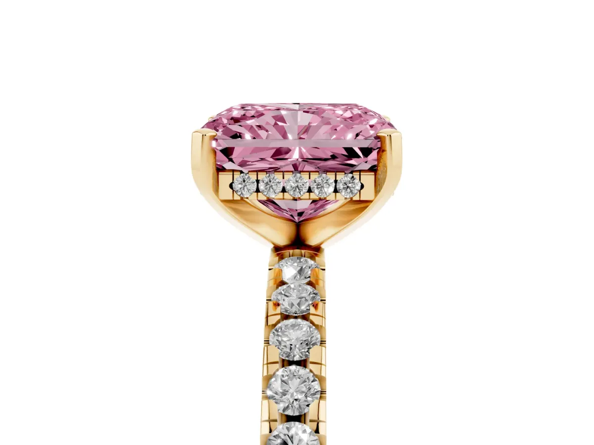 Fancy Pink Radiant Cut Diamond Solitaire Ring with Round Pavé Band and Four-Prong Setting Yellow gold