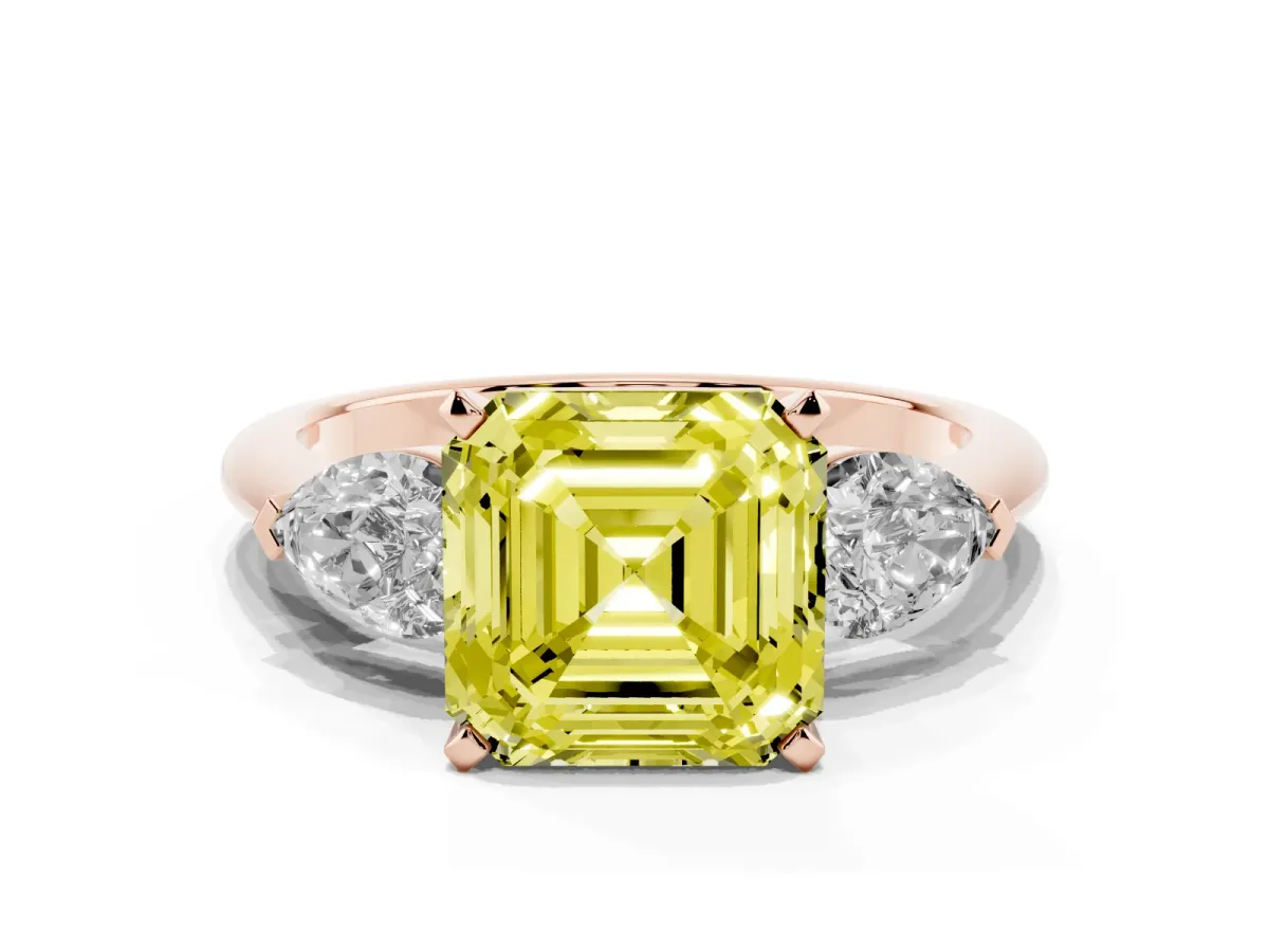Fancy Yellow Three-Stone Asscher Cut Diamond Ring with Pear Side Stones and Four-Prong Setting Rose gold