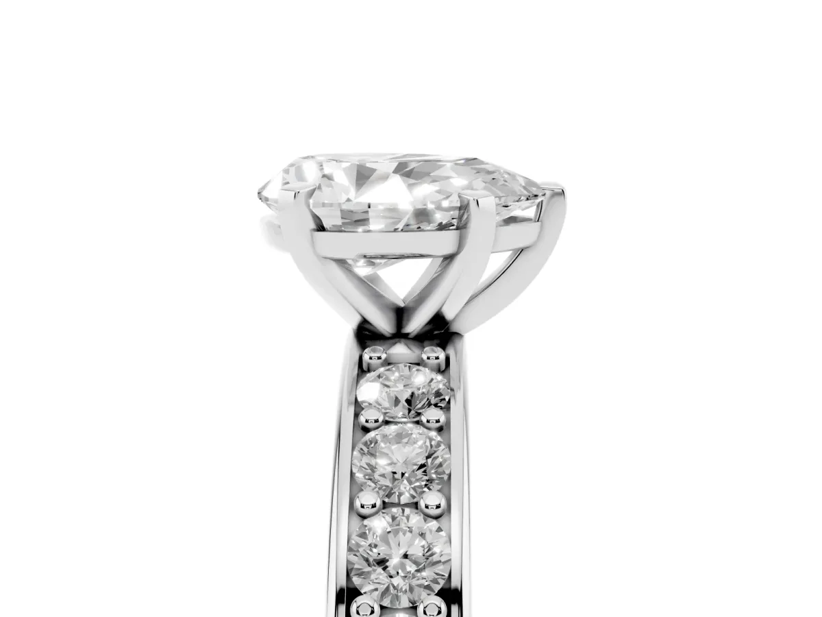 Pear Cut Diamond Engagement Ring with Channel Set Round Band and Prong Setting Silver