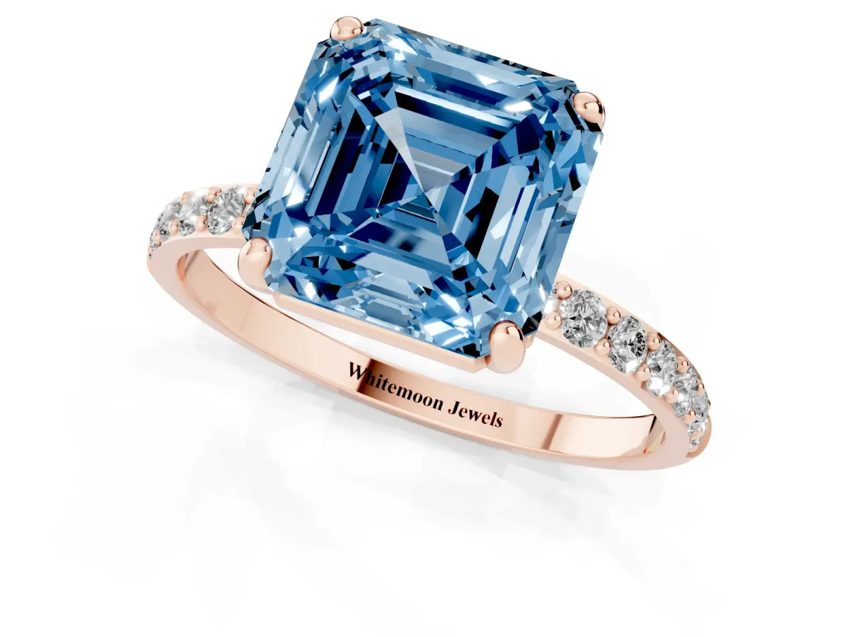 Fancy Blue Asscher Cut Diamond Solitaire Ring with Round Pavé Band and Prong Setting Rose gold