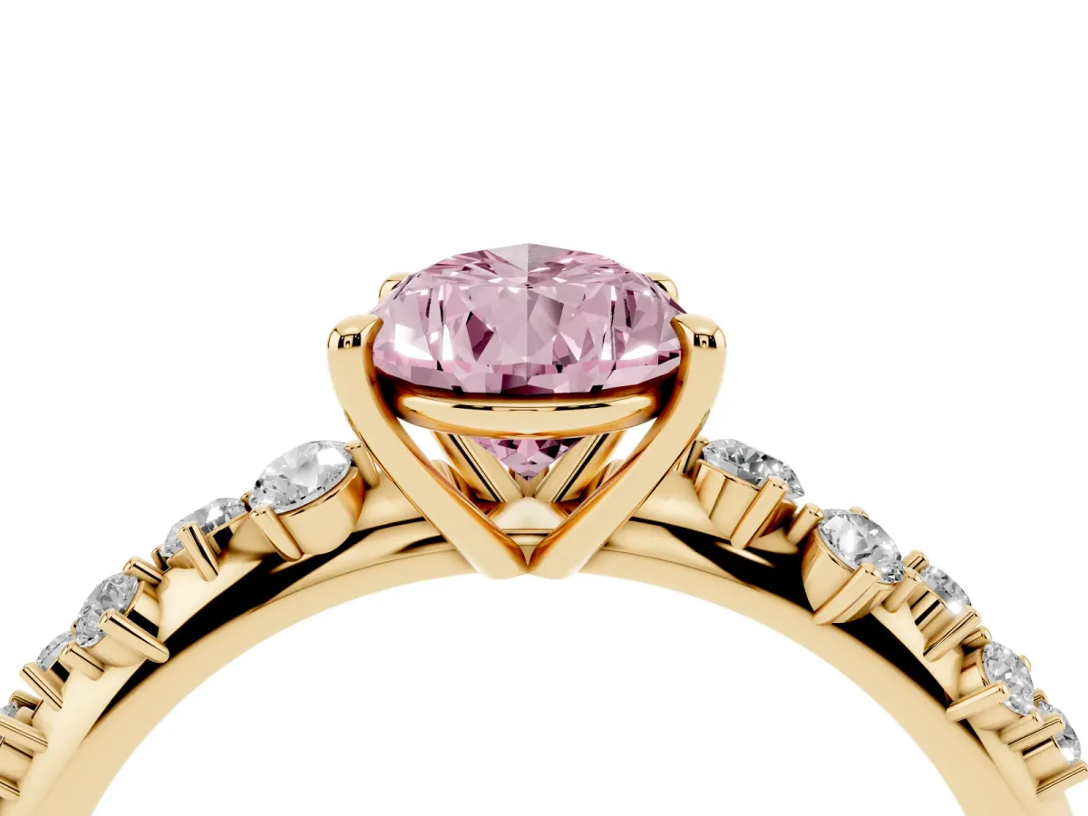 Fancy Pink Pear Cut Diamond Cluster Side Stone Solitaire Ring with Prong Setting Yellow gold