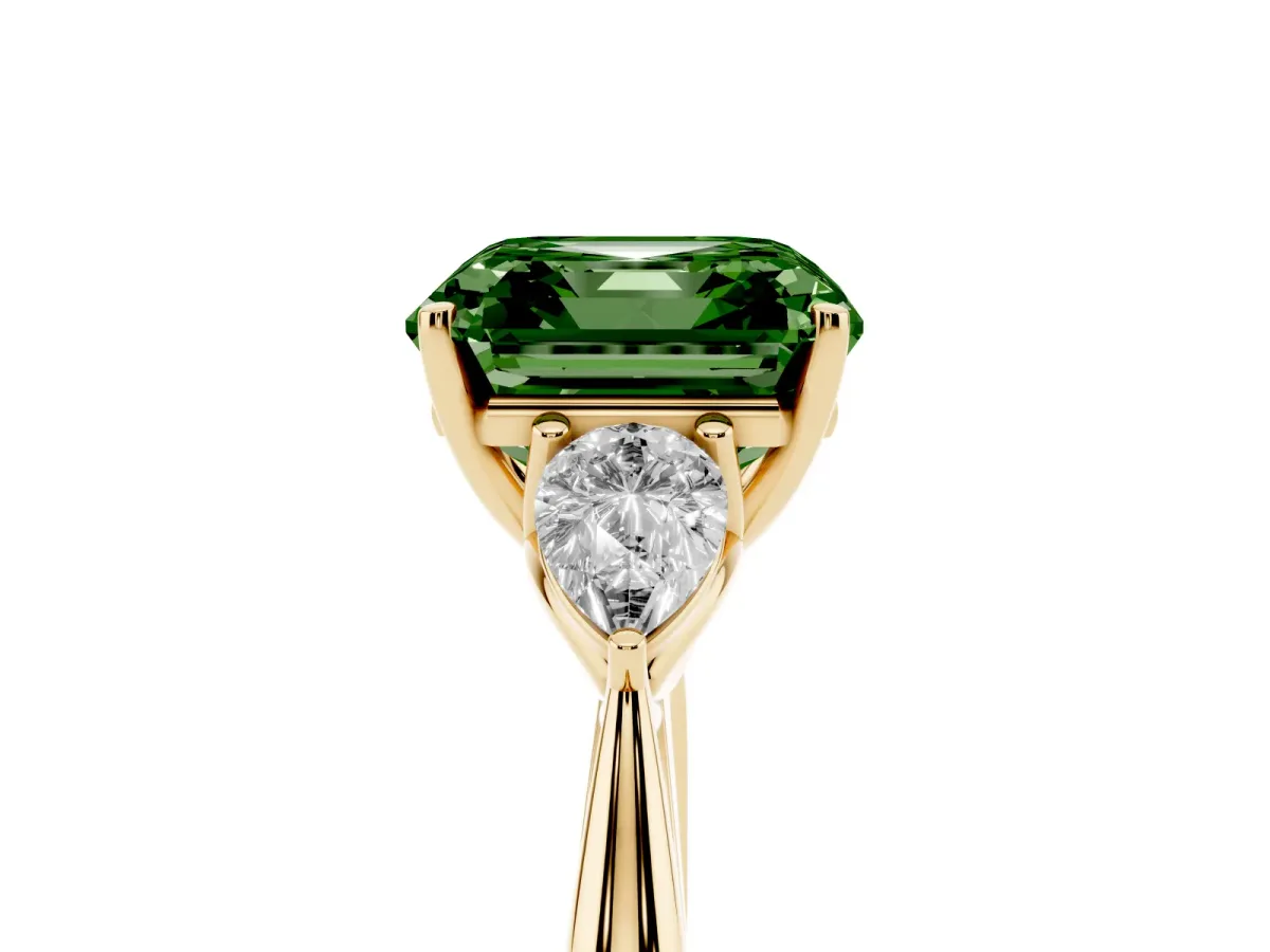 Fancy Green Three-Stone Asscher Cut Diamond Ring with Pear Side Stones in Four-Prong Setting Yellow gold