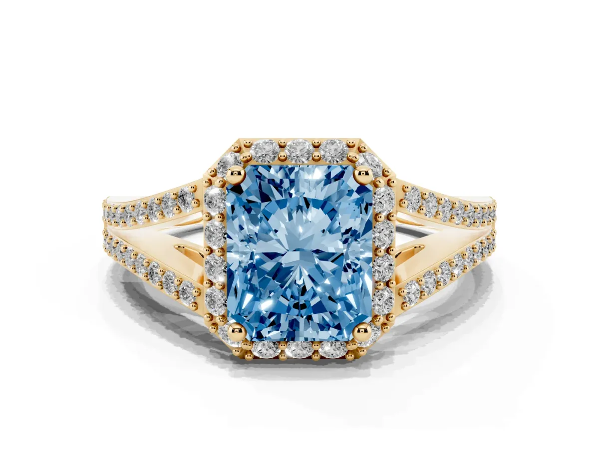 Fancy Blue Radiant Cut Halo Split Shank Pave Diamond Ring with Four-Prong Setting Yellow gold