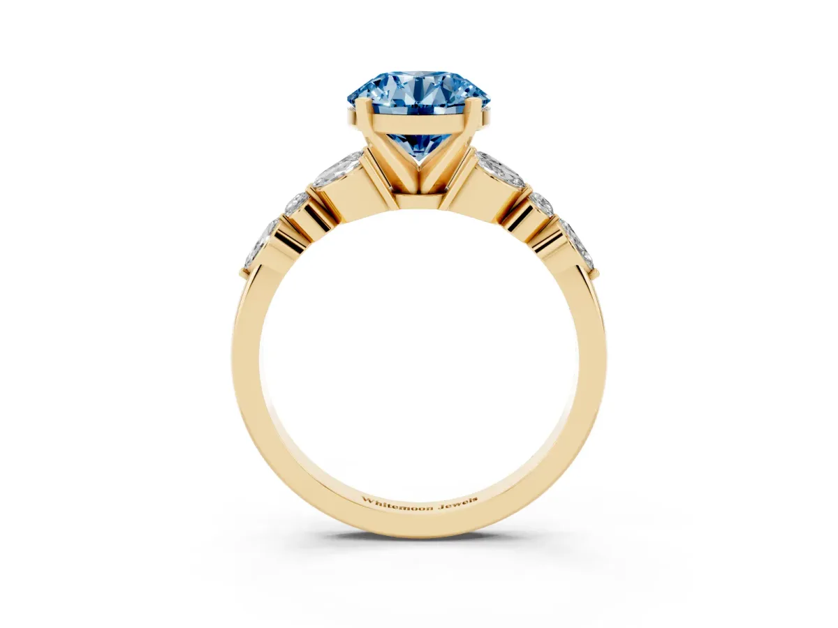 Fancy Blue Round Cut Diamond Solitaire Ring with Side Stones and Four-Prong Setting Yellow gold