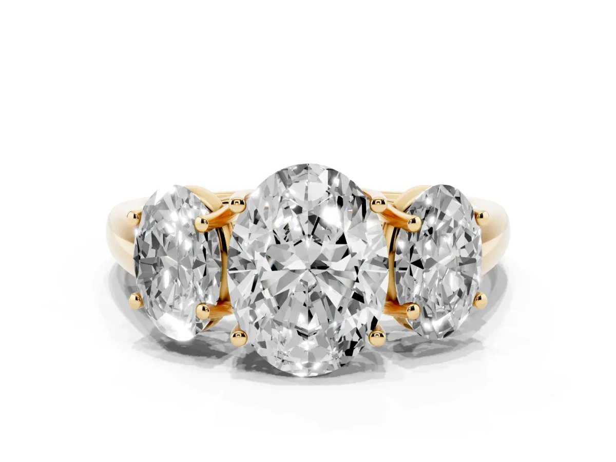 Three-Stone Oval Cut Diamond Engagement Ring with Prong Setting Yellow gold