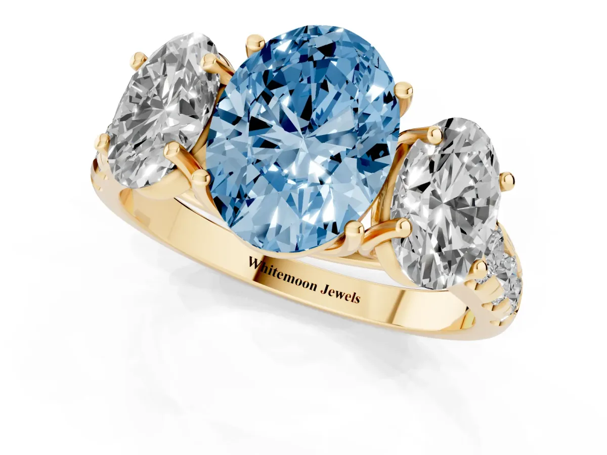Fancy Blue Three-Stone Oval Cut Diamond Pavé Band with Prong Setting Yellow gold