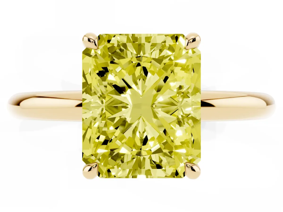 Fancy Yellow Radiant Cut Diamond Solitaire Ring with Thin Band and Four-Prong Setting Yellow gold
