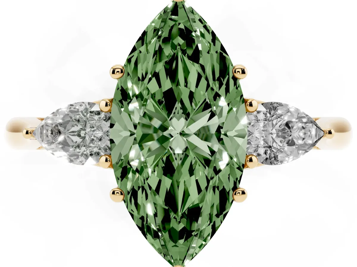 Fancy Green Three-Stone Marquise Cut Diamond Ring with Pear Side Stones in Four-Prong Setting Yellow gold