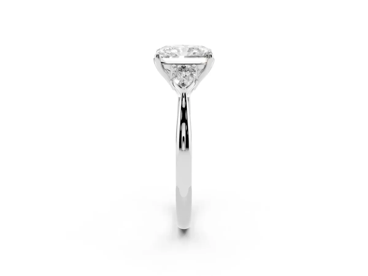 Radiant Cut Diamond Three-Stone Ring with Pear Side Stones and Prong Setting Platinum
