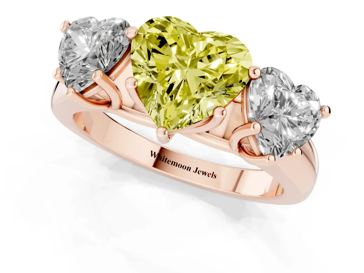 Fancy Yellow Heart Cut Three-Stone Diamond Ring with Prong Setting on a Classic Band Rose gold