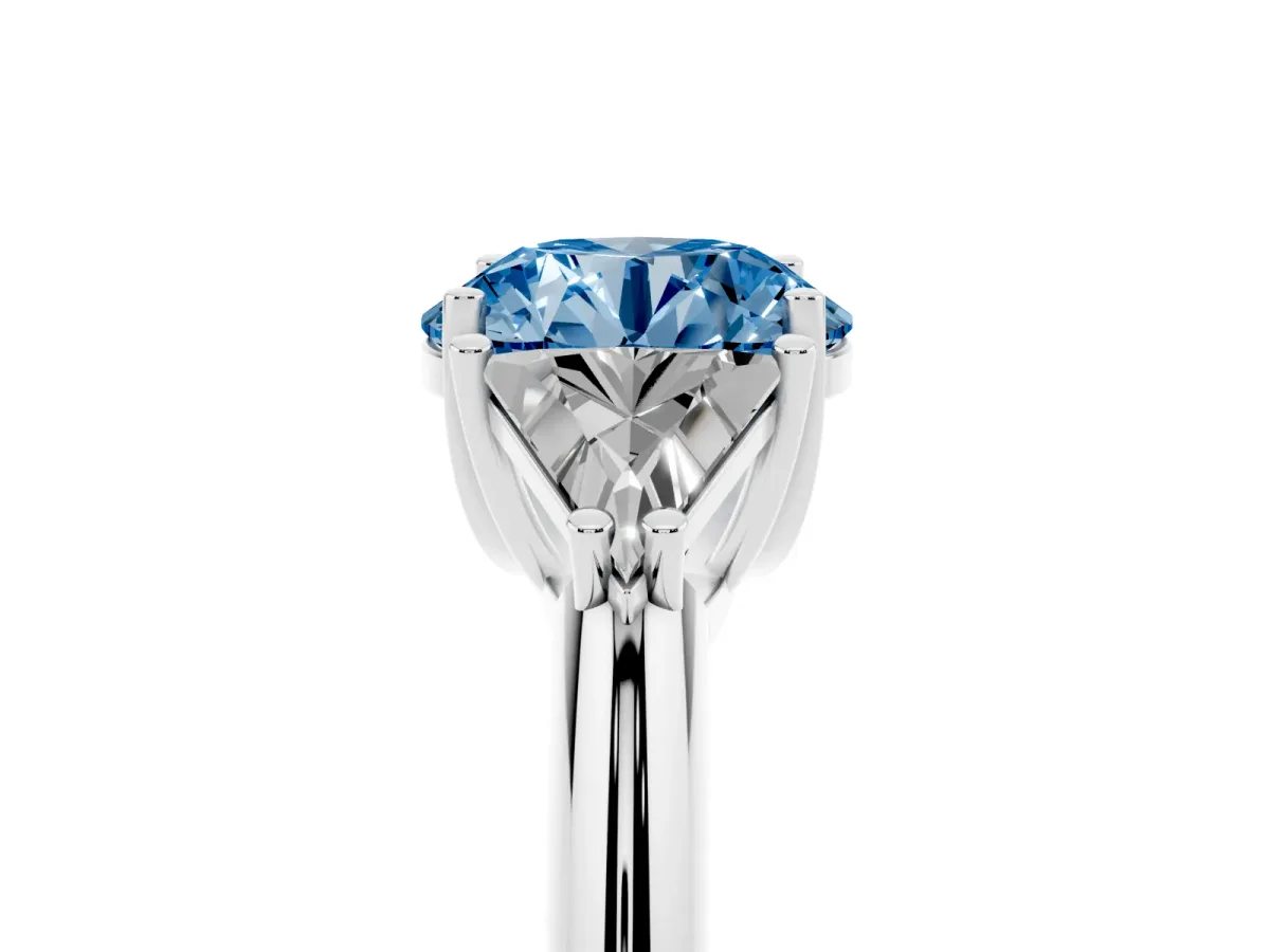 Fancy Blue Three-Stone Round Cut Diamond Engagement Ring with Trillion Side Stones and Prong Setting Silver