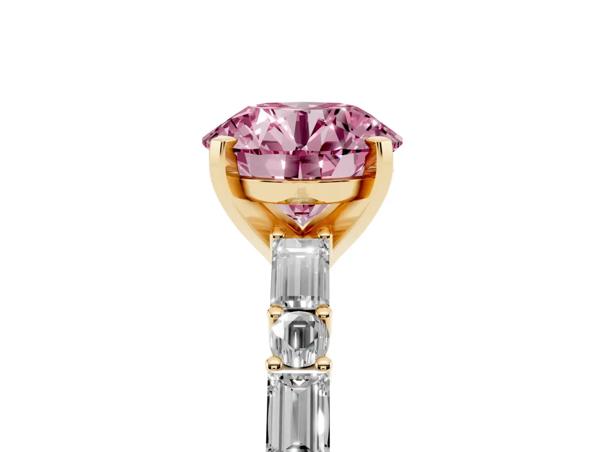Fancy Pink Round Cut Diamond Solitaire with Side Baguettes and Channel Set Band Yellow gold