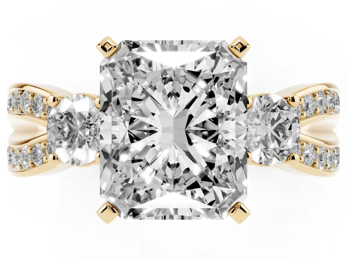 Three-Stone Radiant Cut Cut Diamond Twist Band with Prong Setting Yellow gold