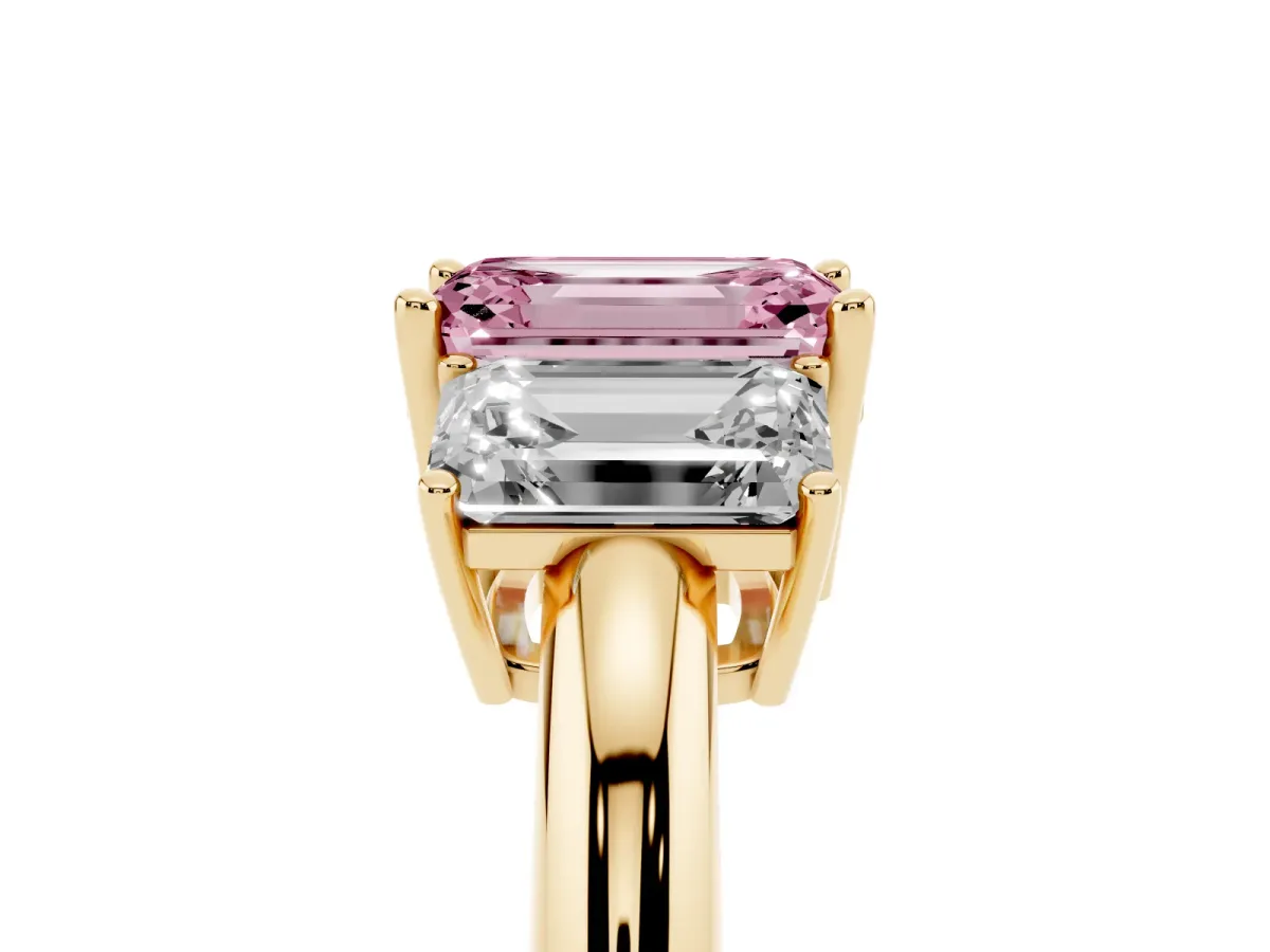 Fancy Pink Three-Stone Emerald Cut Cut Diamond Engagement Ring with Prong Setting on a White Gold Band Yellow gold