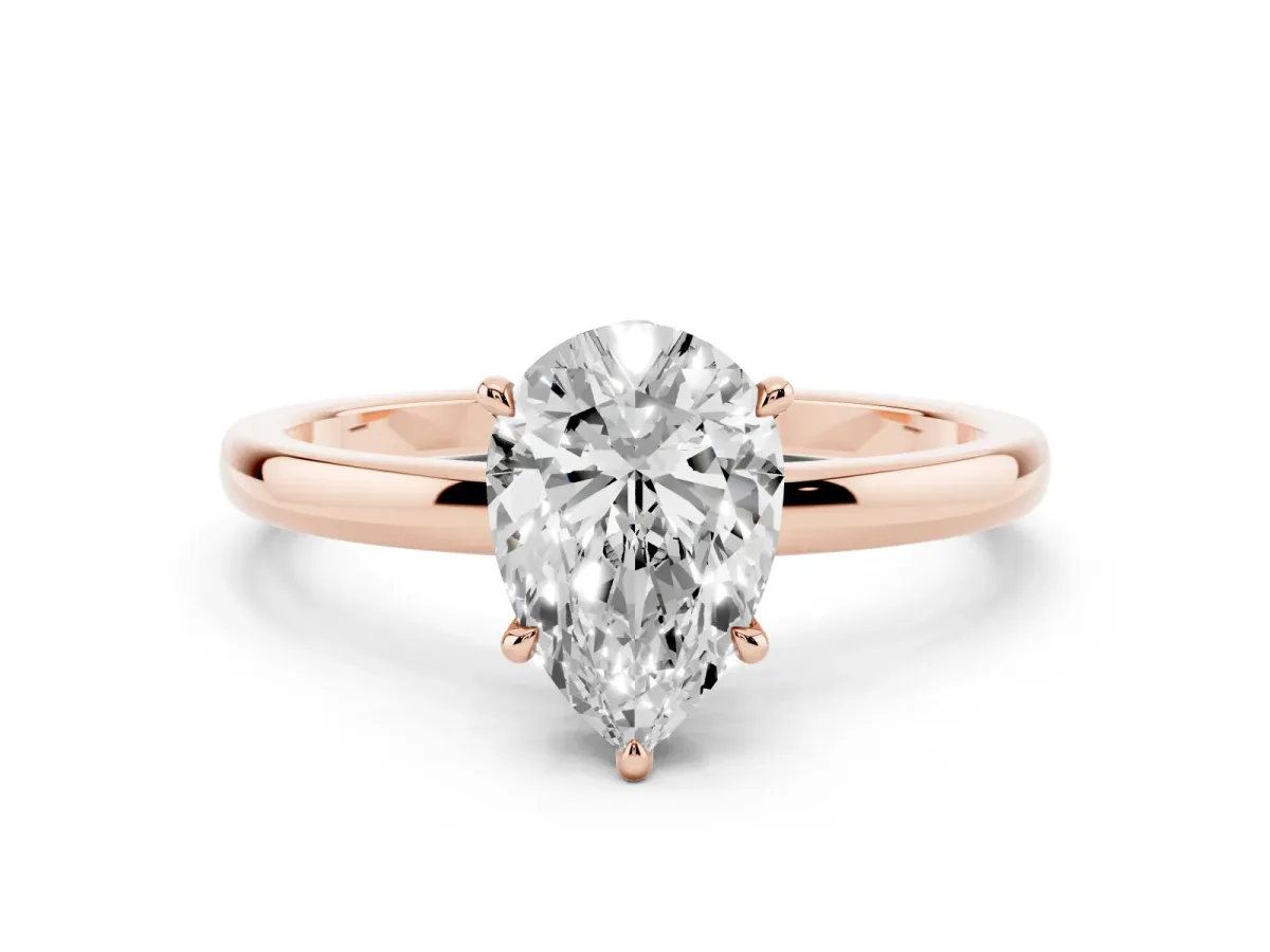 Pear Cut Solitaire Engagement Ring with Cathedral Band and Four-Prong Setting Rose gold