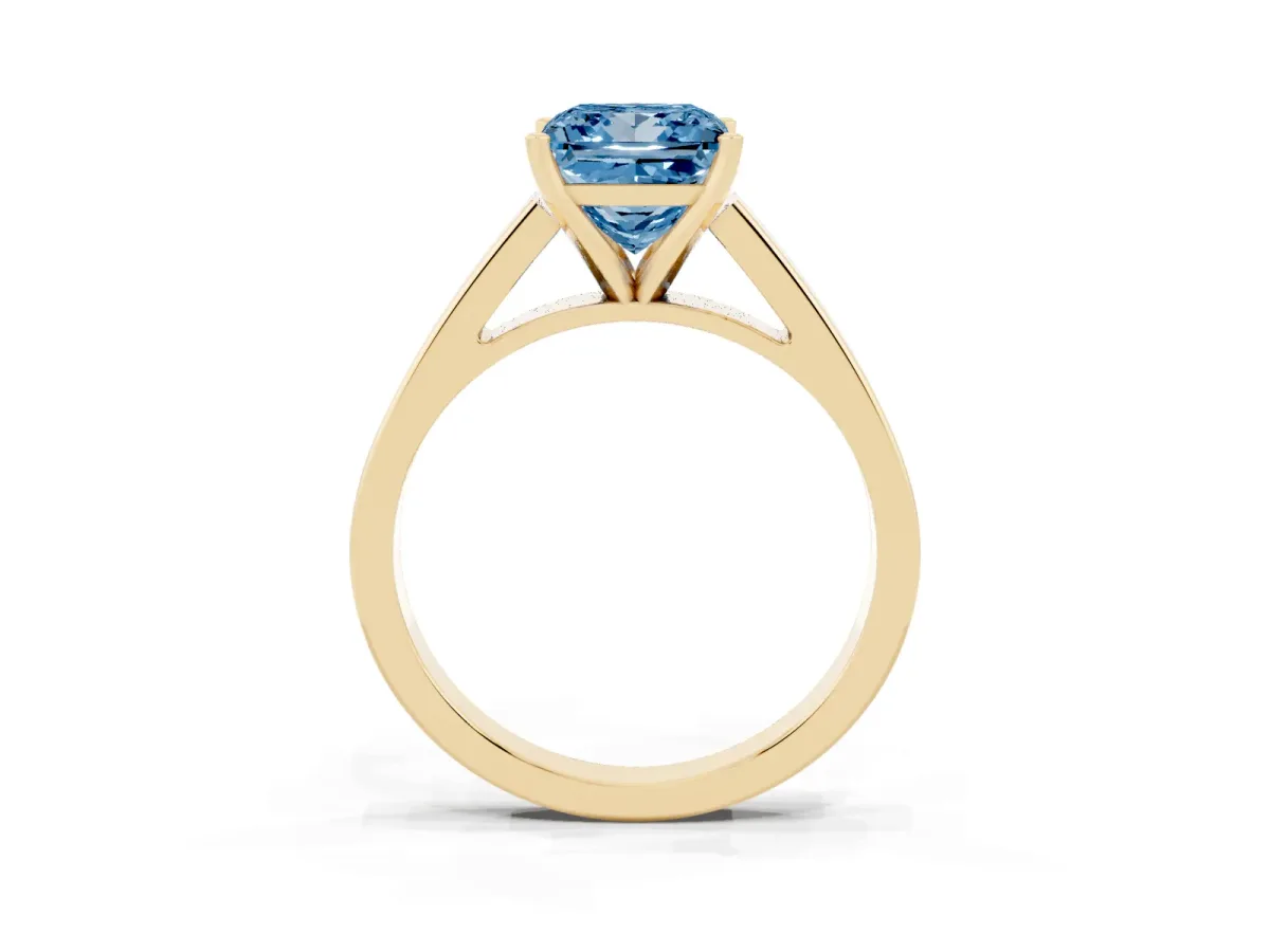 Fancy Blue Princess Cut Solitaire Engagement Ring with Four-Prong Setting and Tapered Band Yellow gold