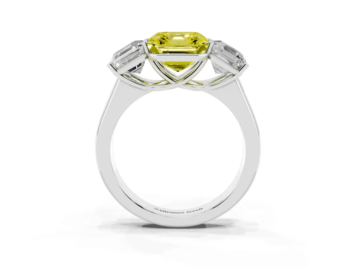 Fancy Yellow Asscher Cut Three-Stone Diamond Ring with Prong Setting on a Classic Band Silver