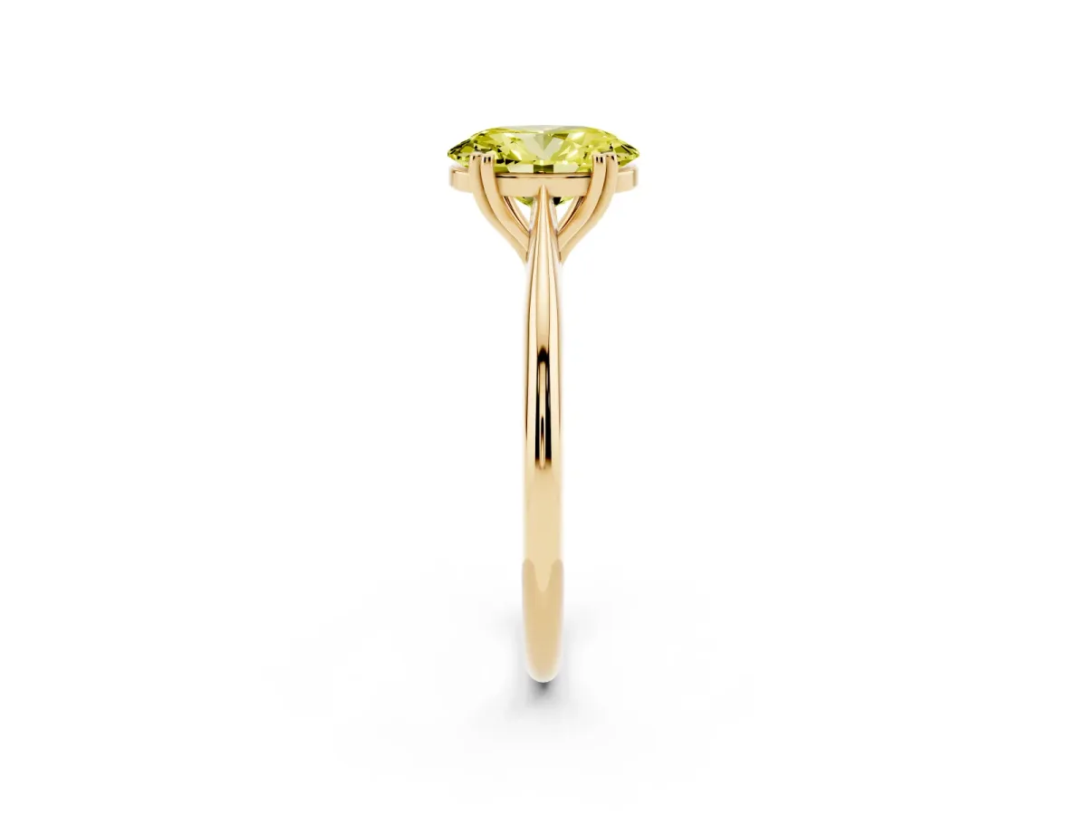 Fancy Yellow Oval Cut Solitaire Diamond Ring with Six-Prong Setting and Classic Band Yellow gold