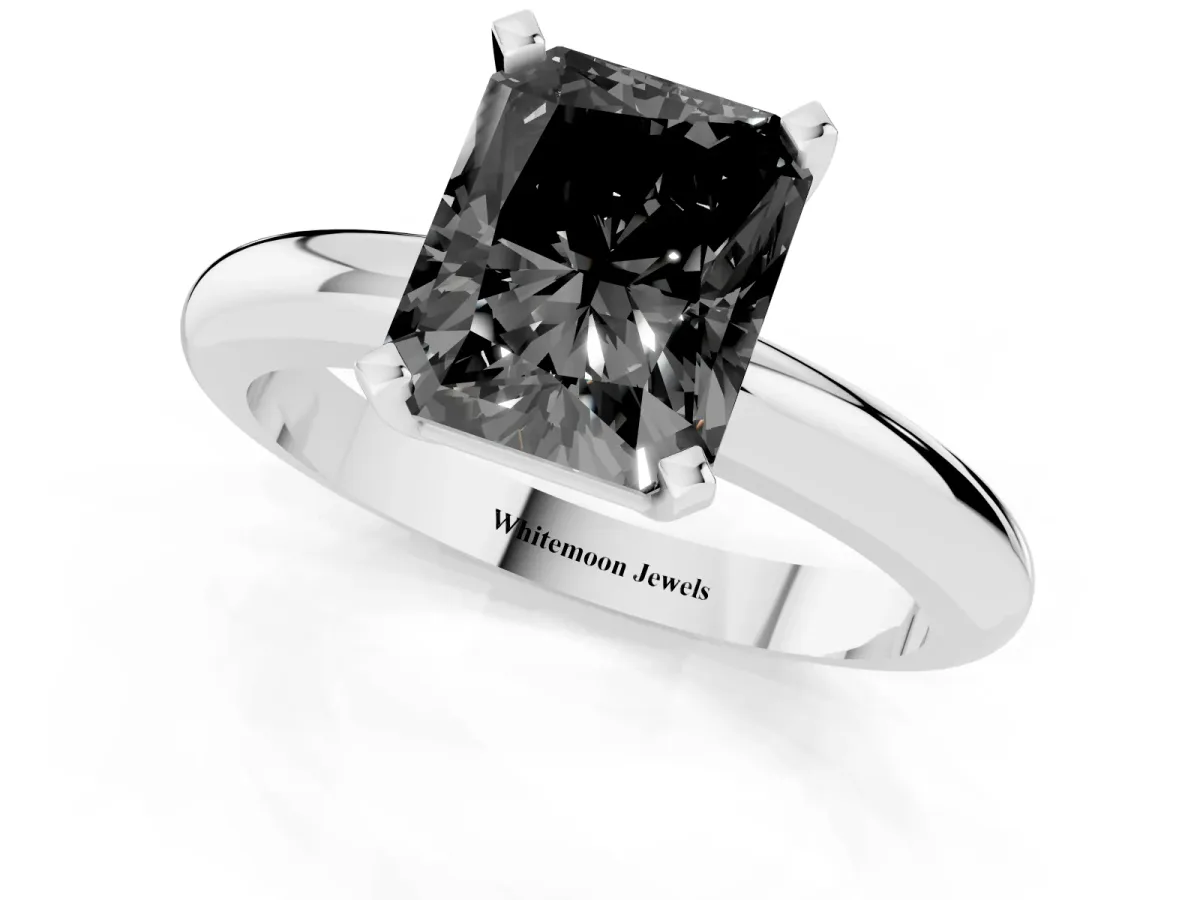 Fancy Black Radiant Cut Diamond Solitaire Engagement Ring with Round Band and Four-Prong Setting Silver