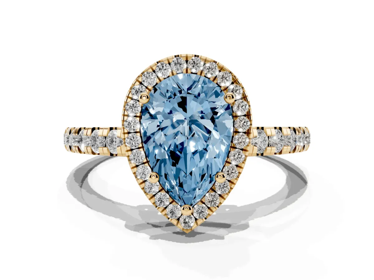 Fancy Blue Pear Cut Diamond Halo Ring with Pavé Band and Four-Prong Setting Yellow gold