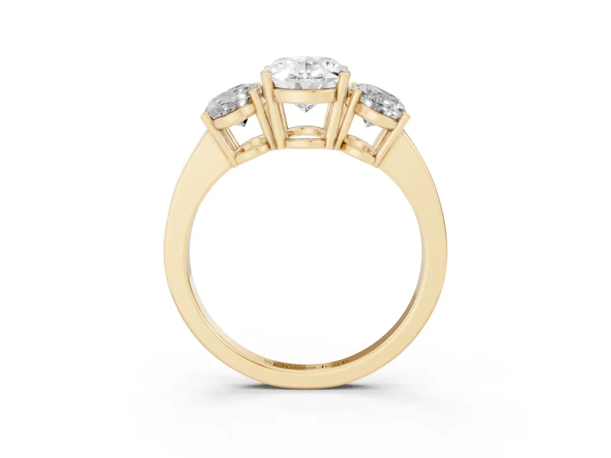 Three-Stone Oval Cut Cut Diamond Engagement Ring with Flat Band and Four-Prong Setting Yellow gold