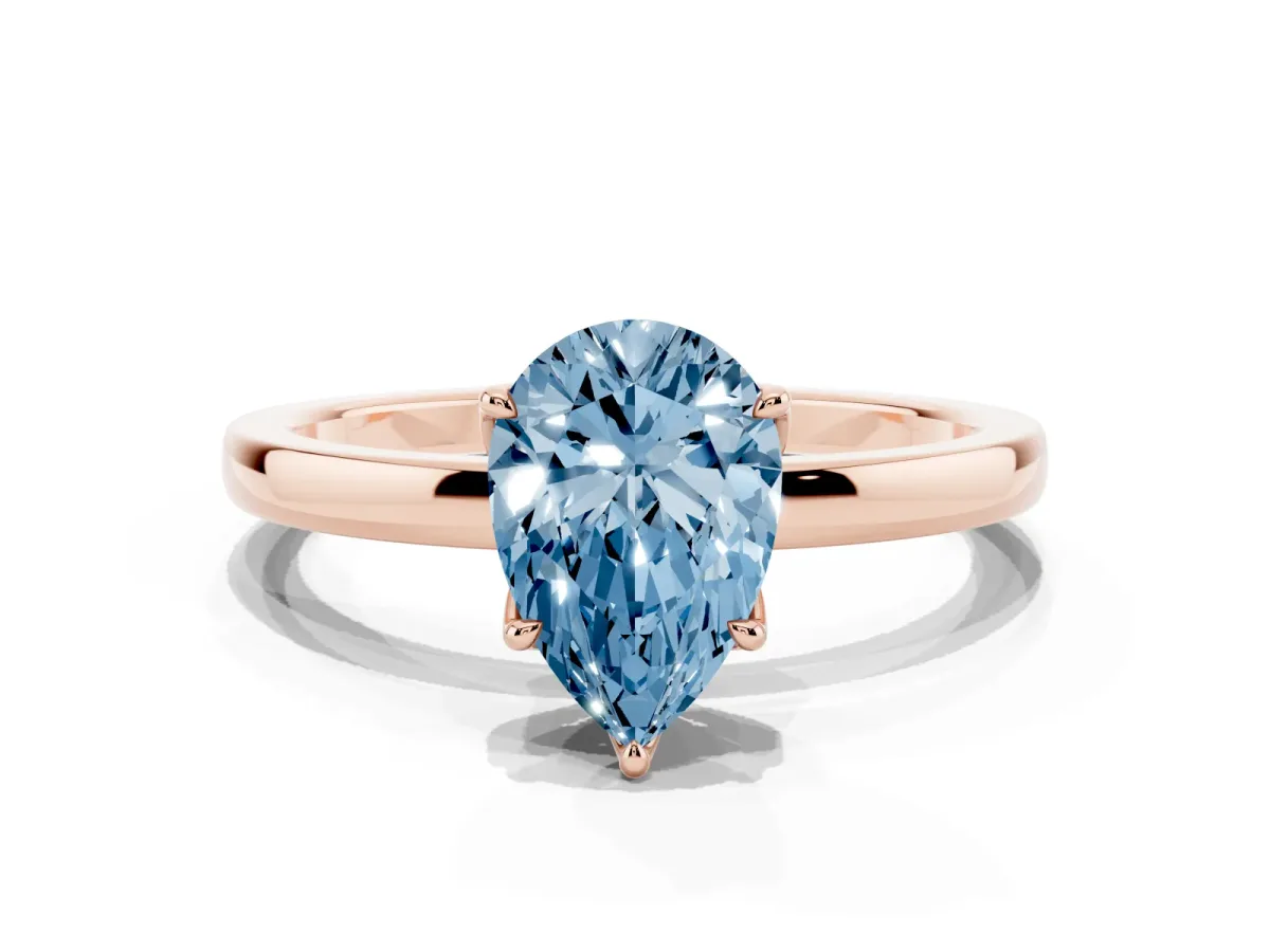 Fancy Blue Pear Cut Diamond Solitaire Ring with Thin Band and Prong Setting Rose gold