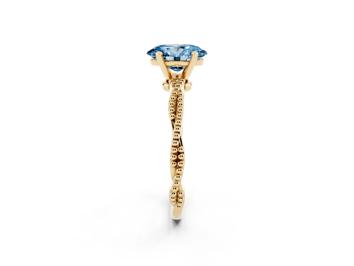 Fancy Blue Oval Cut Solitaire Twisted Band with Bead Prong Setting Yellow gold