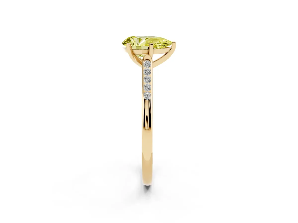 Fancy Yellow Pear Cut Diamond Solitaire Ring with Channel Set Round Band and Prong Setting Yellow gold