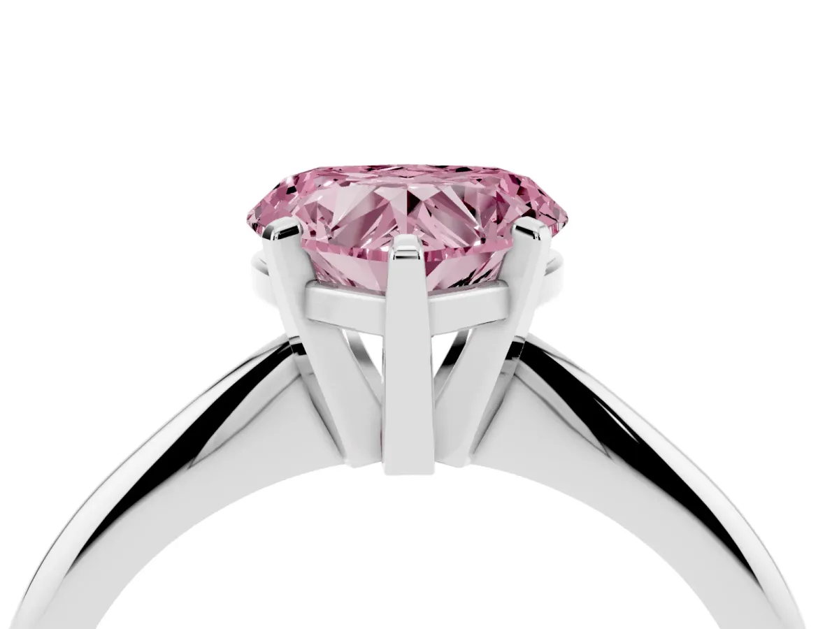 Fancy Pink Heart Cut Cut Solitaire Ring with Four-Prong Setting on a Classic Band Silver