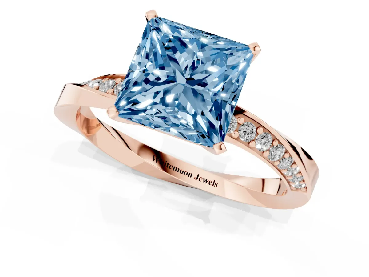 Fancy Blue Princess Cut Diamond Engagement Ring with Side Stone Accents and Four-Prong Setting Rose gold