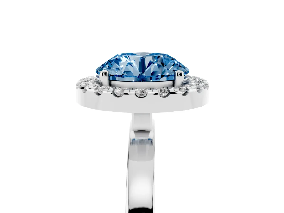 Fancy Blue Round Cut Halo Diamond Solitaire with Pavé Band and Four-Prong Setting Silver