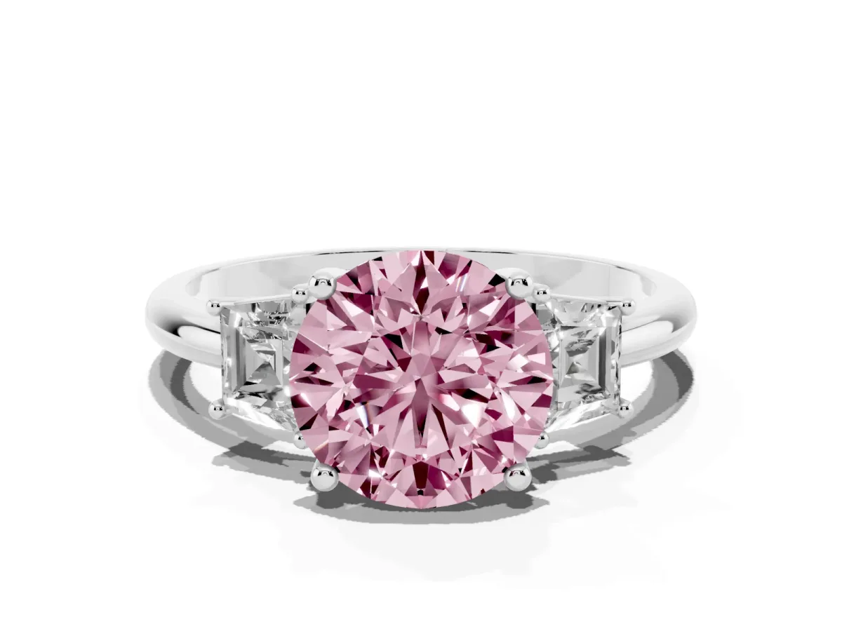 Fancy Pink Round Cut Diamond Three-Stone Ring with Trapezoid Side Stones and Prong Setting Platinum