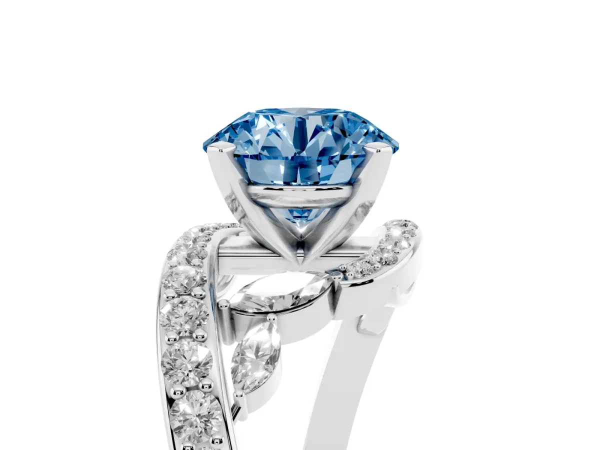 Fancy Blue Round Cut Solitaire with Pavé Twist Band and Four-Prong Setting Silver