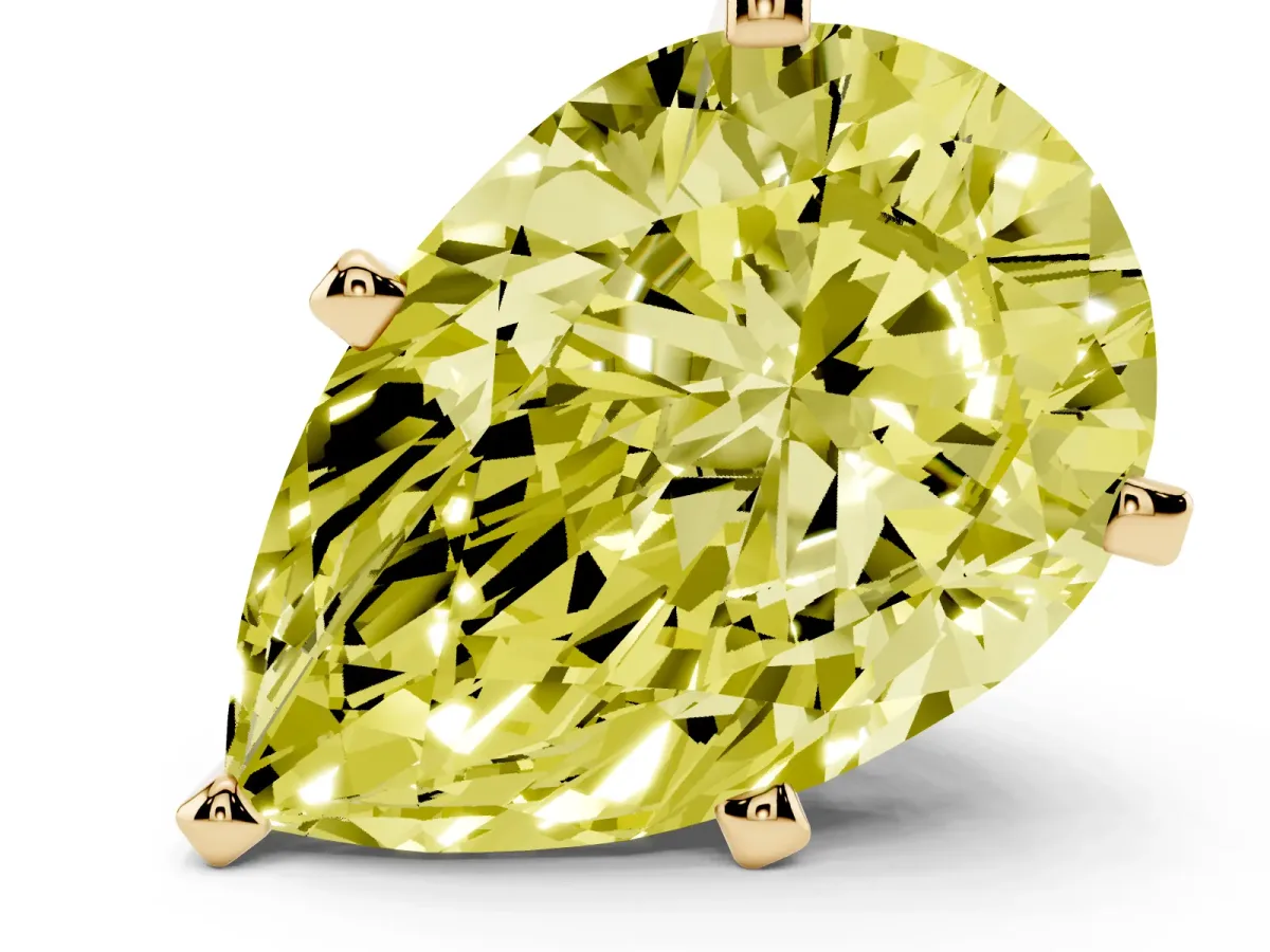 Fancy Yellow Pear Cut Diamond Solitaire Ring with Prong Setting and Classic Band Yellow gold