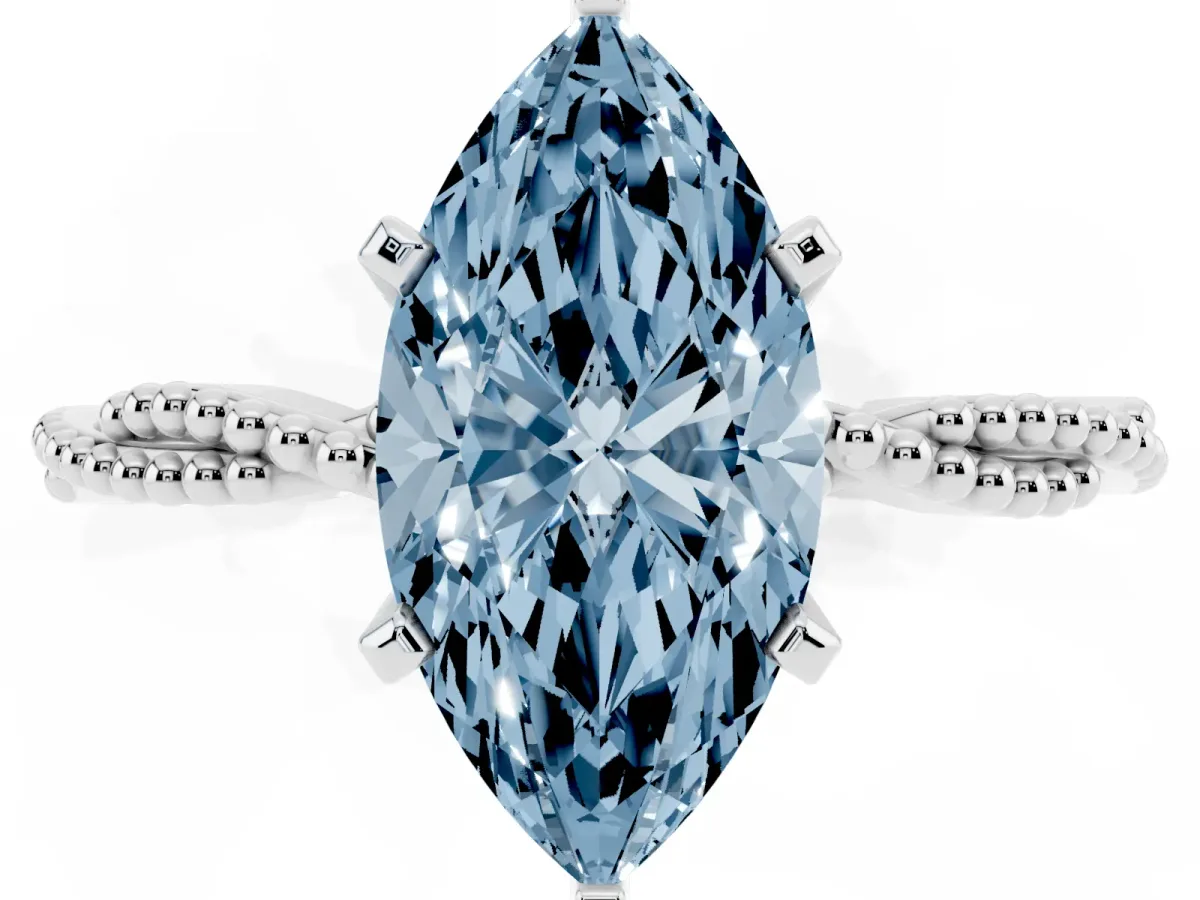 Fancy Blue Marquise Cut Solitaire Twisted Band with Bead Prong Setting Silver