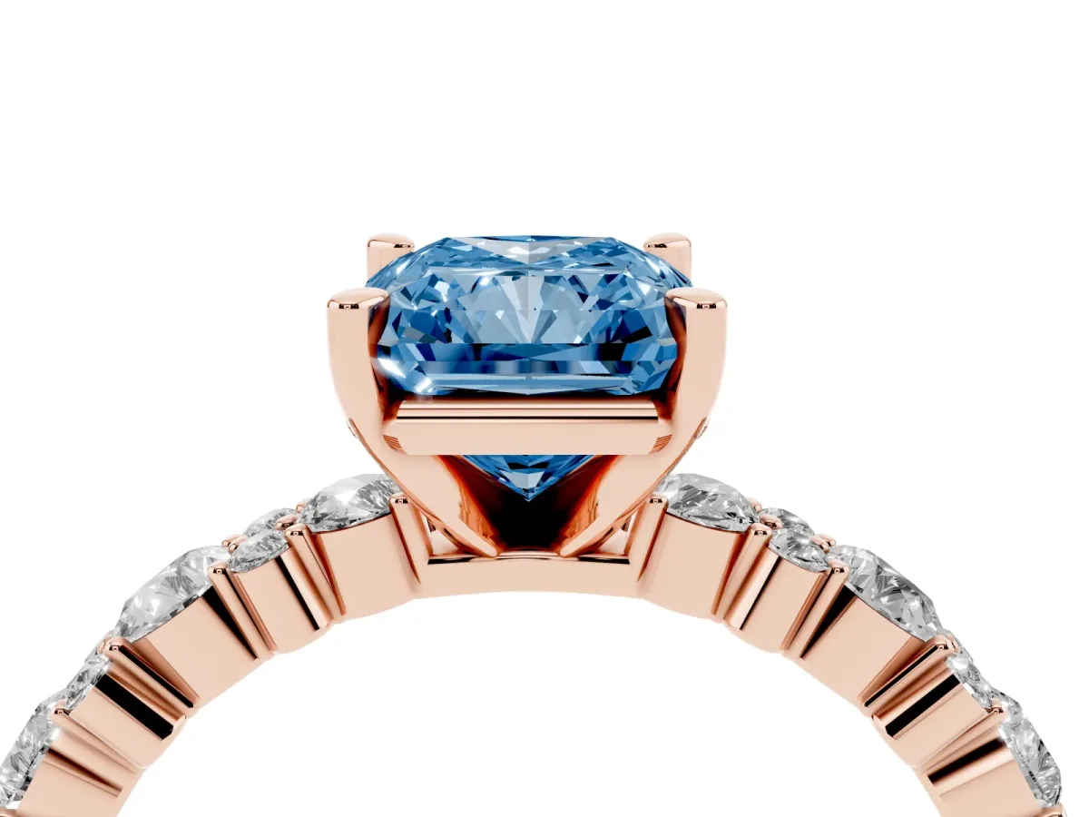 Fancy Blue Radiant Cut Diamond Side Stone Solitaire Ring with Round and Four-Prong Setting Rose gold