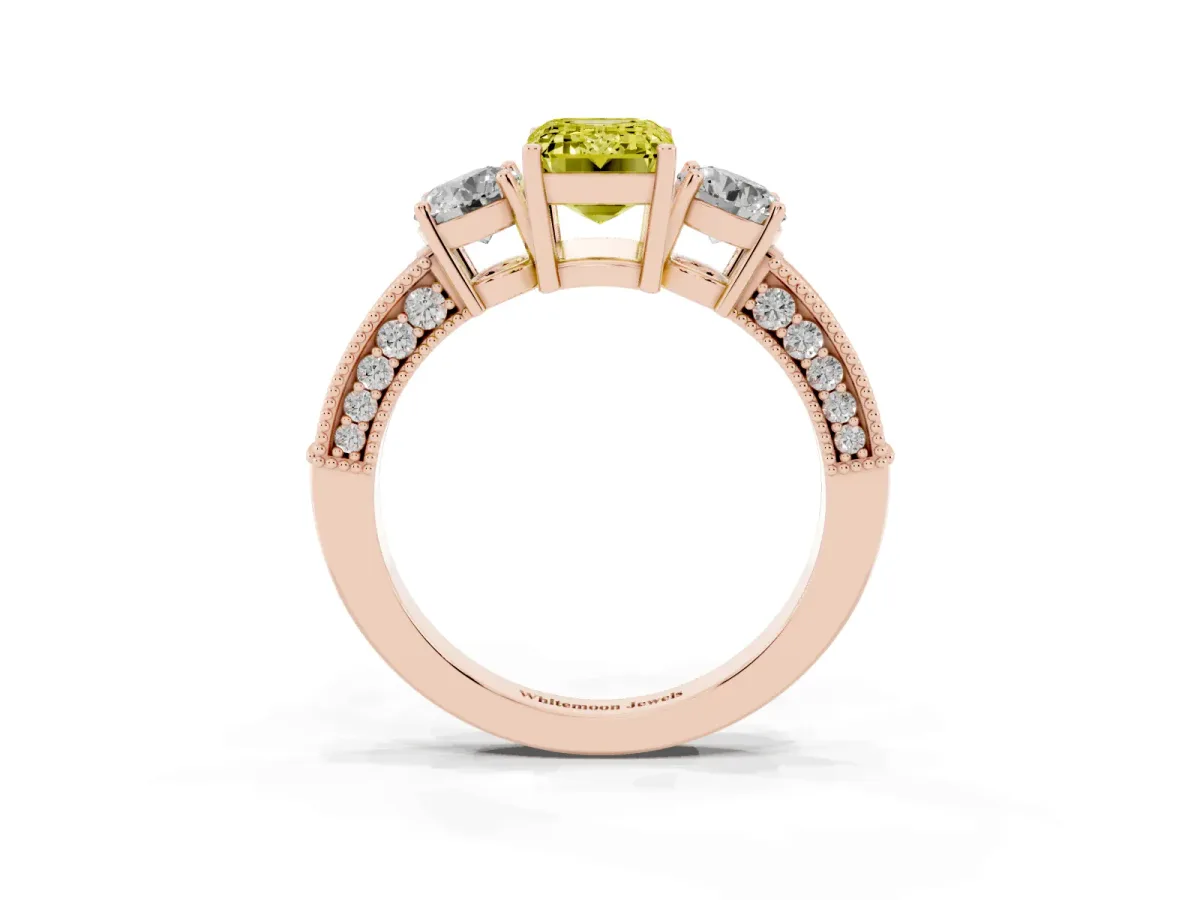 Fancy Yellow Emerald Cut Three-Stone Diamond Ring with Pavé Band and Four-Prong Setting Rose gold