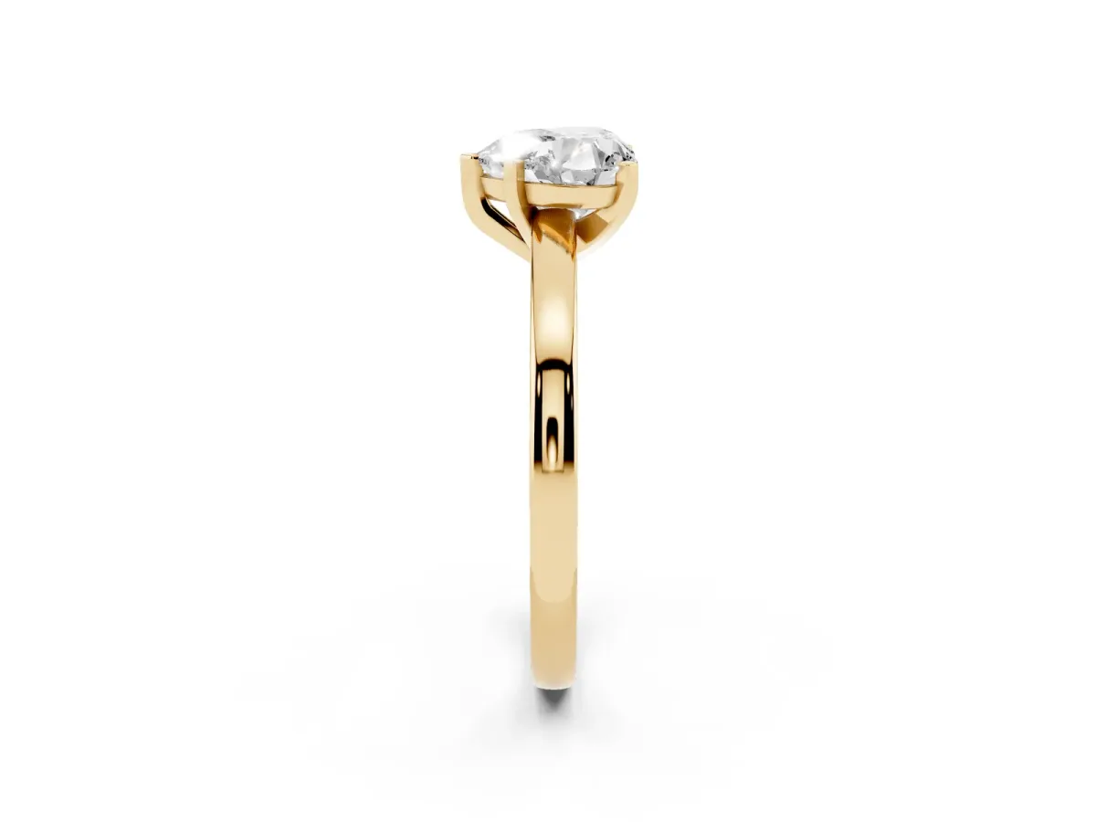 Heart Cut Solitaire Diamond Engagement Ring with Four-Prong Setting on a Classic Band Yellow gold