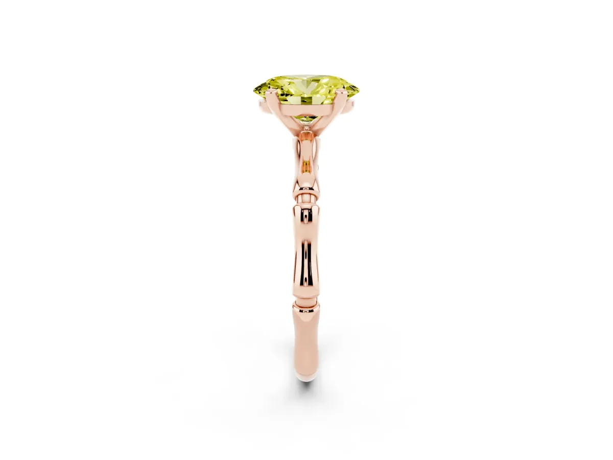 Fancy Yellow Oval Cut Solitaire Diamond Ring with Bamboo Band and Four-Prong Setting Rose gold