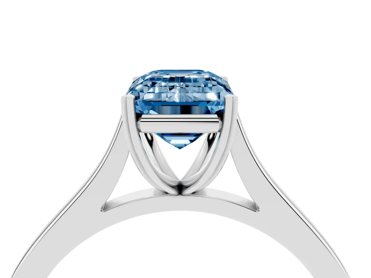 Fancy Blue Emerald Cut Solitaire Heart Prong Engagement Ring with Tapered Band Silver